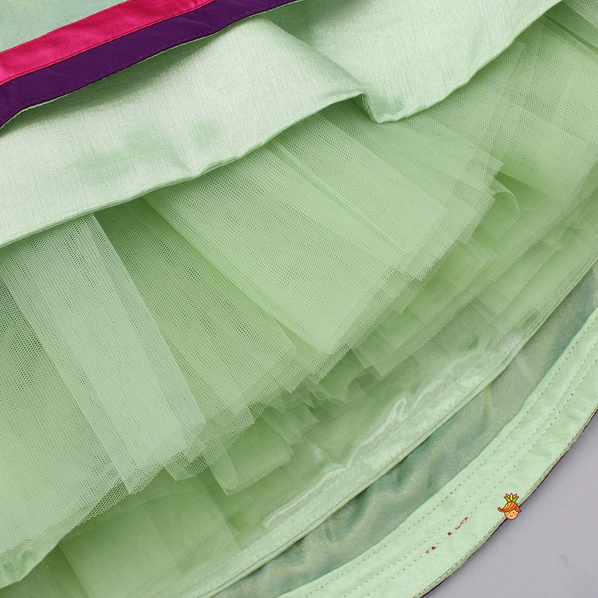 Pre Order: Pink Embroidered Top And Green Lehenga With Dupatta And Matching Potli Bag