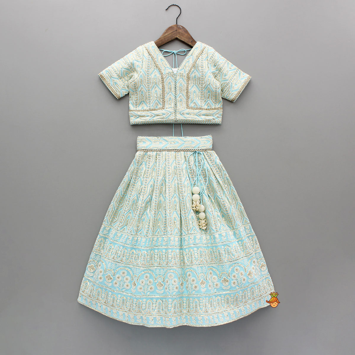 Pre Order: Blue Embroidered Top And Lehenga With Dupatta And Matching Potli Bag