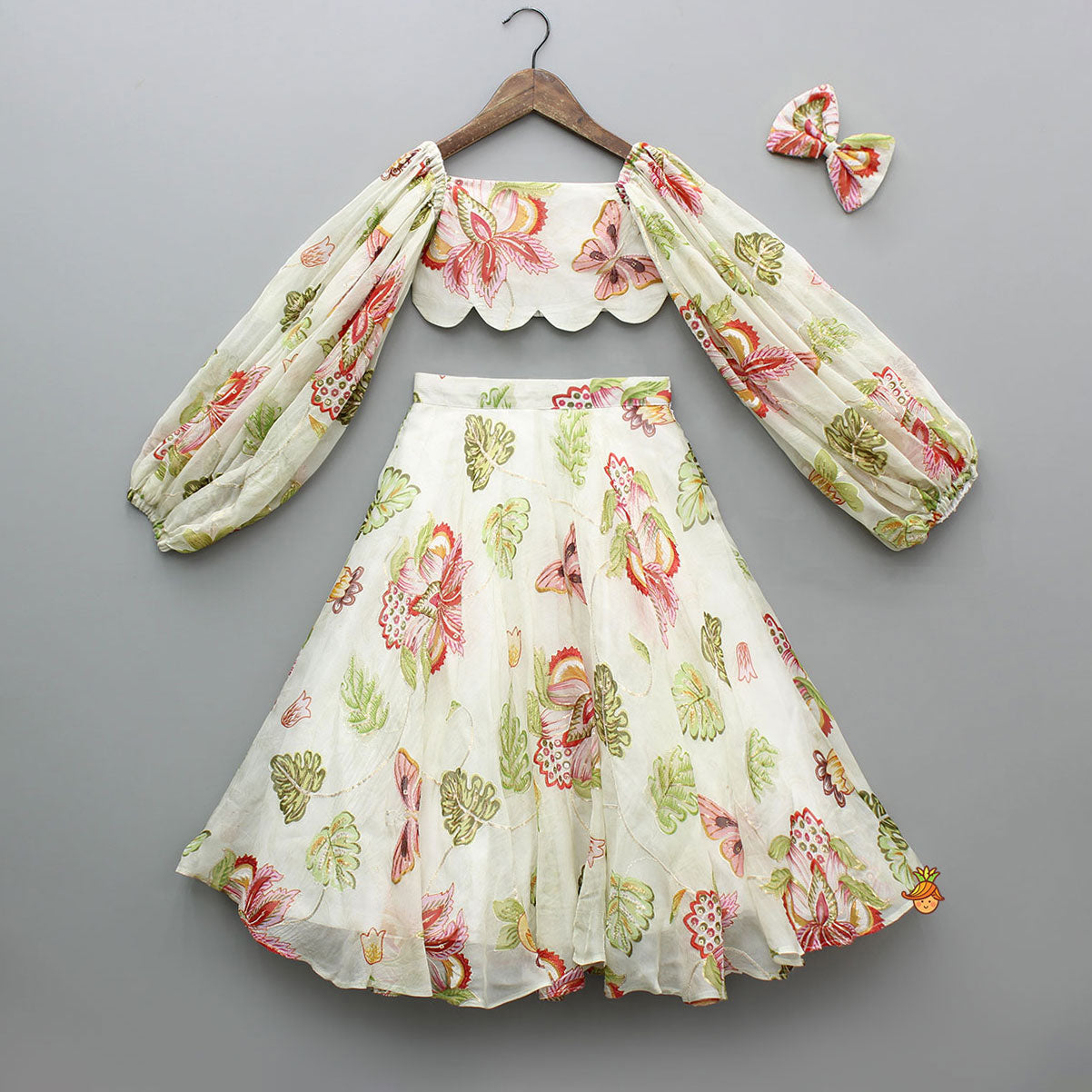 Pre Order: Beige Printed Embroidered Top And Umbrella Style Flared Lehenga With Matching Hairclip