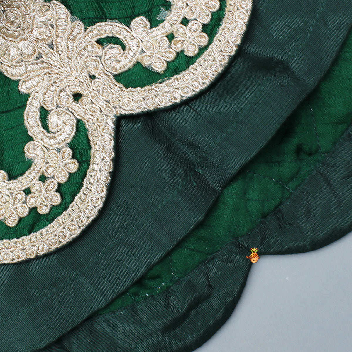 Pre Order: Green Lace Embroidered One Shoulder Top With Attached Pleated Dupatta And Stylish Dhoti Skirt