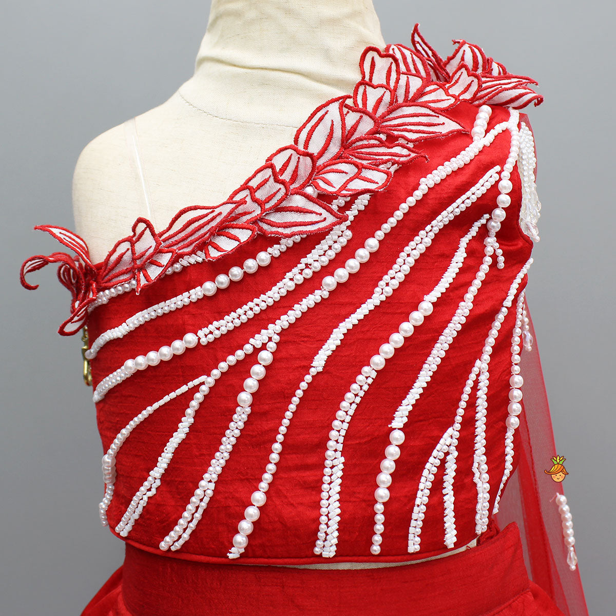 Pre Order: Red One Shoulder Embellished Top With Attached Dupatta And Stylish Lehenga