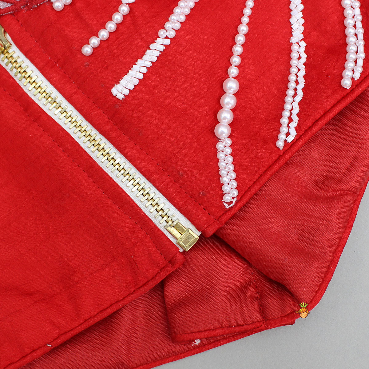 Pre Order: Red One Shoulder Embellished Top With Attached Dupatta And Stylish Lehenga