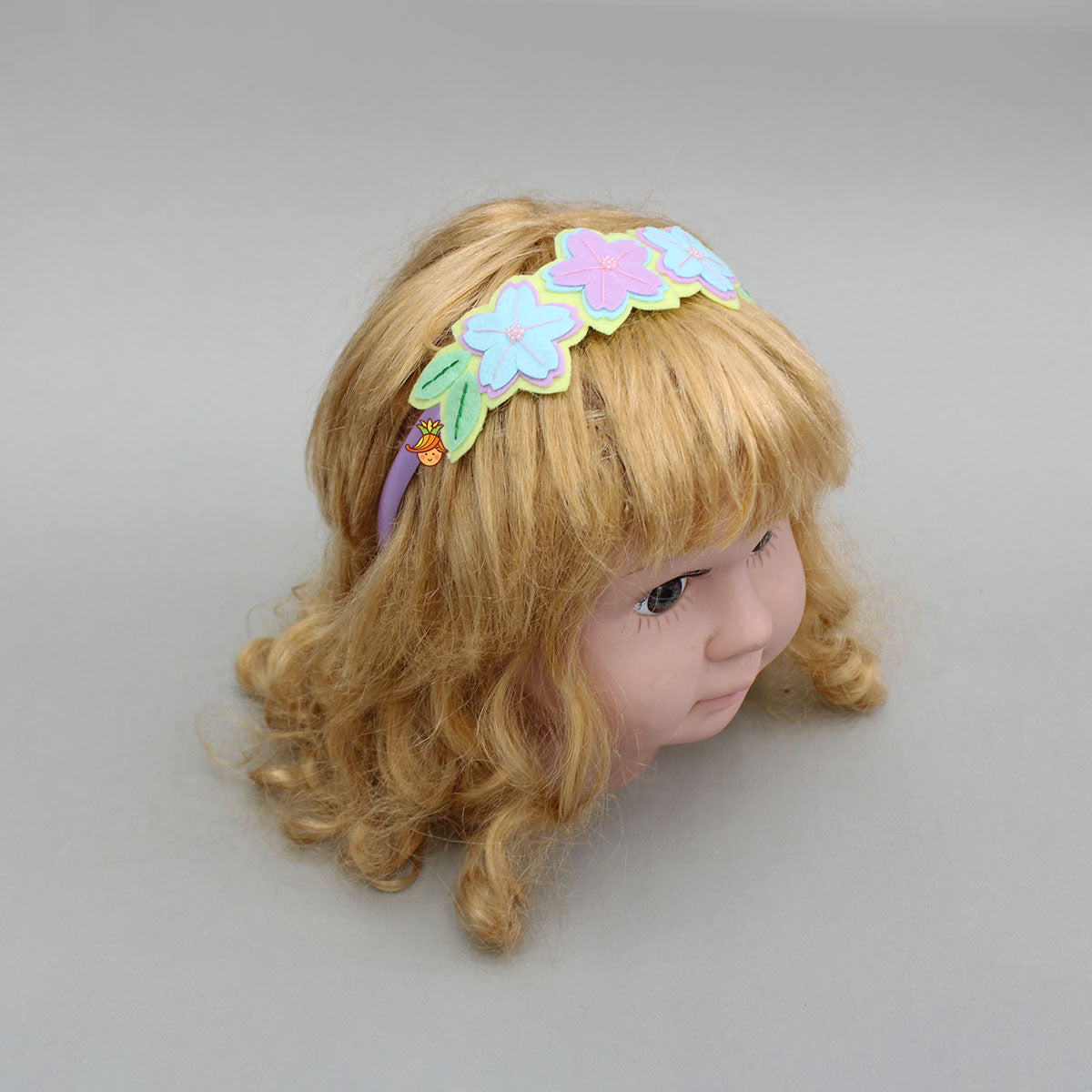 Multicoloured Artificial Flower Embellished Hairband