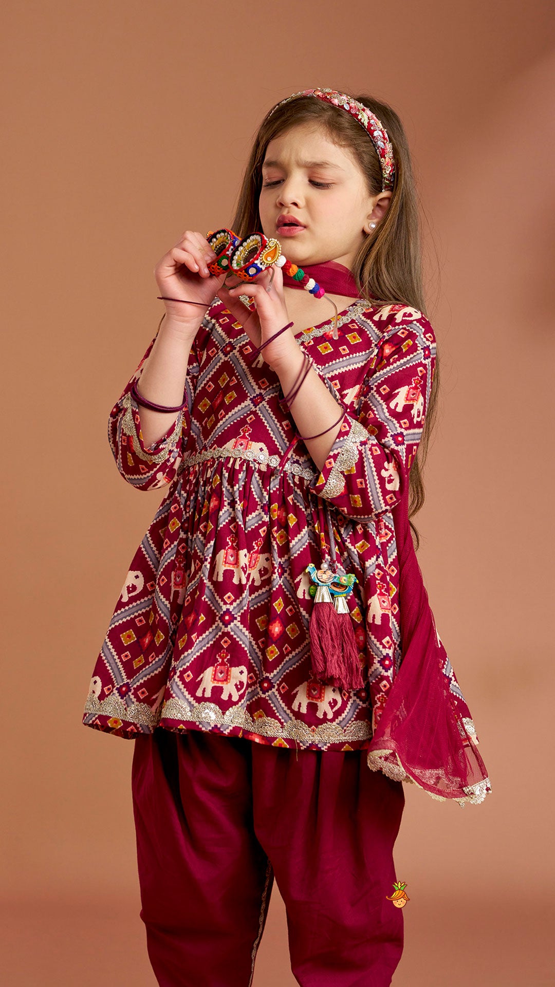 Pre Order: Beautiful Patola-Printed Angarkha Style Kurti And Dhoti With Dupatta
