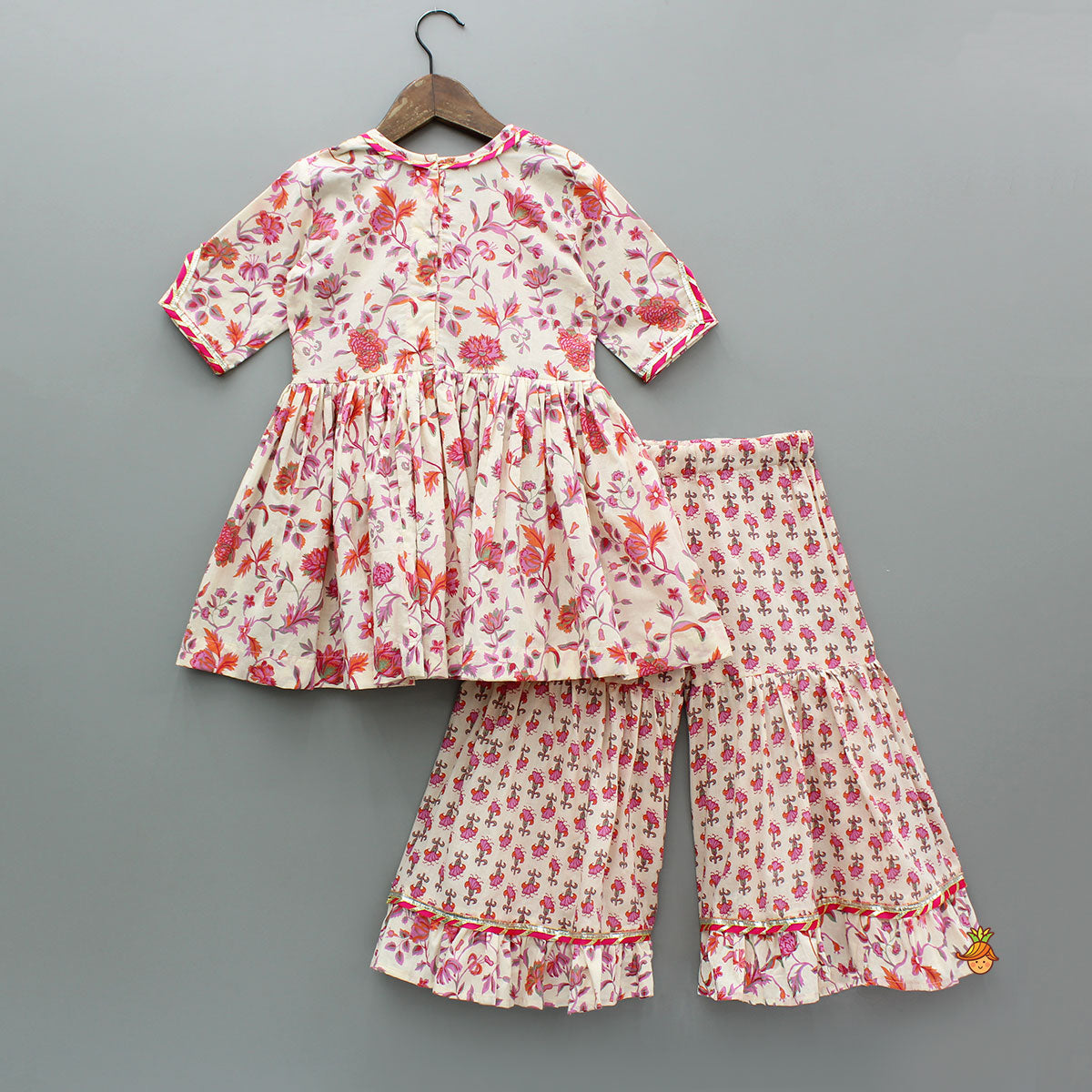 Pre Order: Tassel Adorned Floral Print Kurti And Sharara With Dupatta