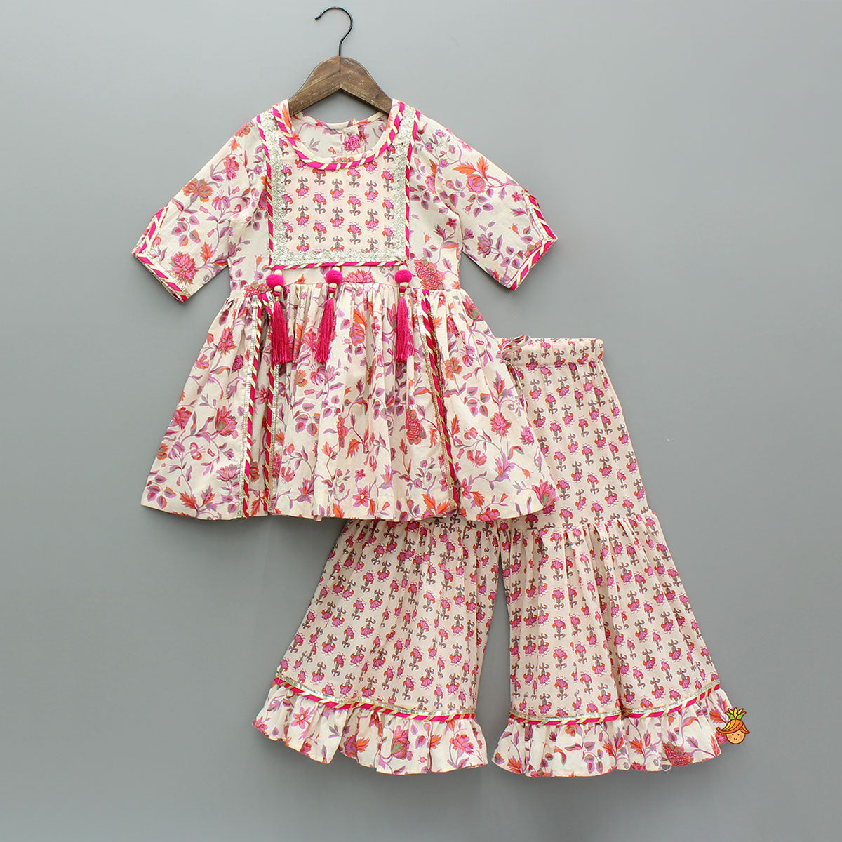 Pre Order: Tassel Adorned Floral Print Kurti And Sharara With Dupatta