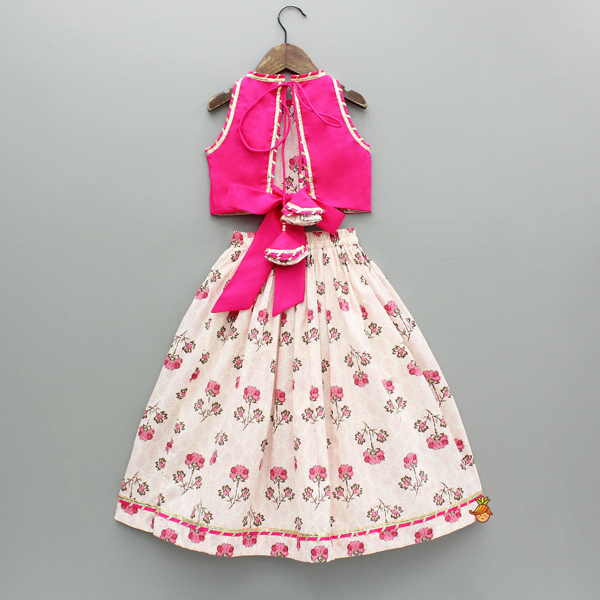 Pre Order: Goddess Embroidered Pink Top And Beautiful Tassels Embellished Lehenga With Matching Sling Bag
