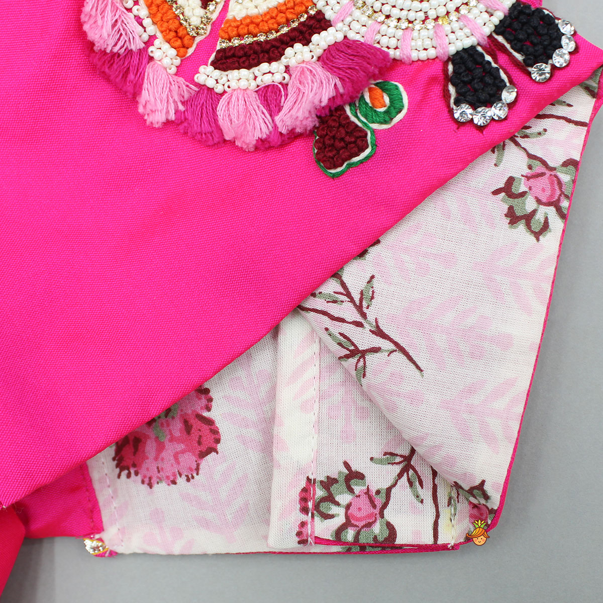 Pre Order: Goddess Embroidered Pink Top And Beautiful Tassels Embellished Lehenga With Matching Sling Bag