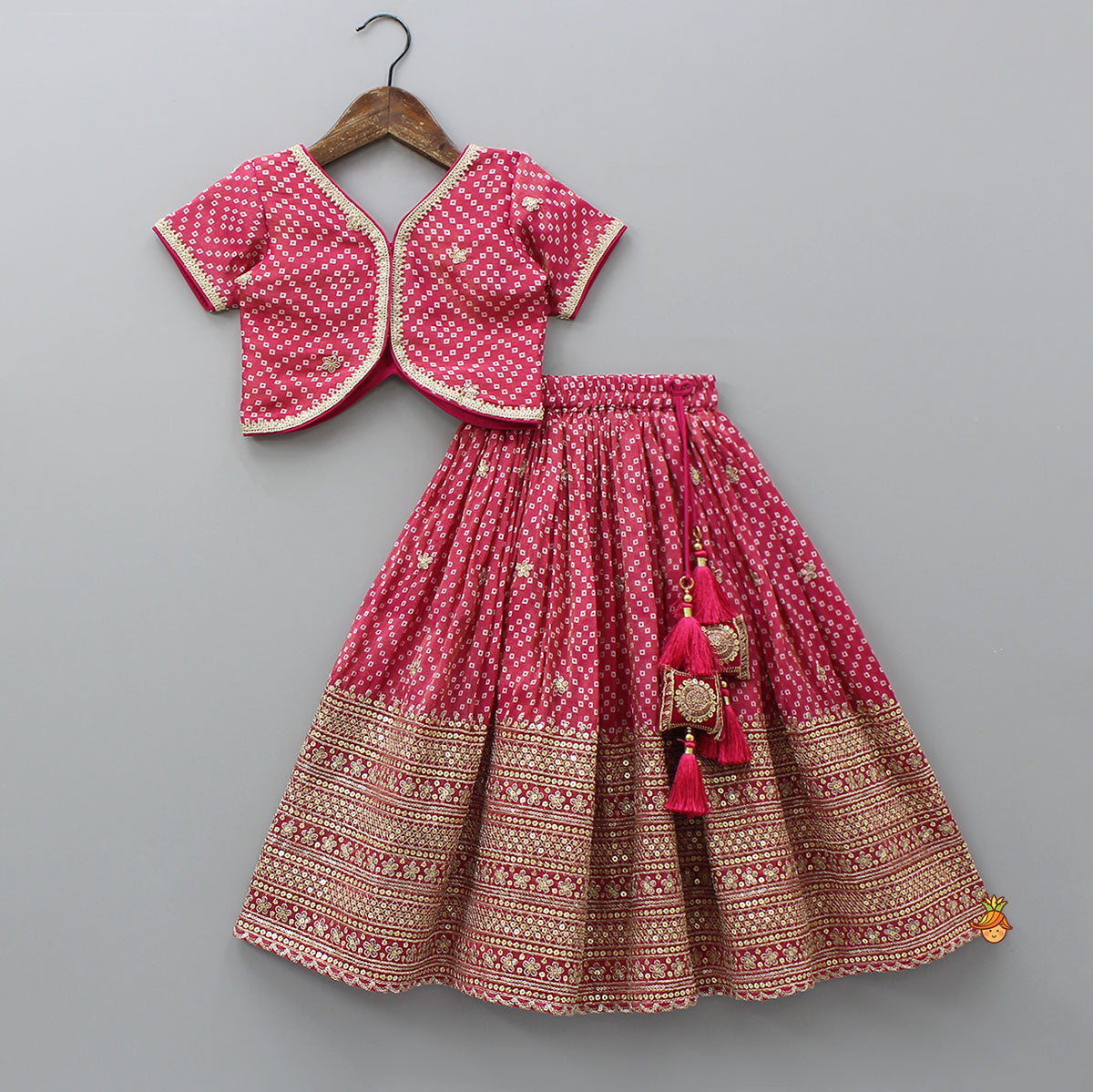 V-Neck Bandhani-Printed Pink Shimmery Top And Lehenga With Sequins Embroidered Matching Dupatta