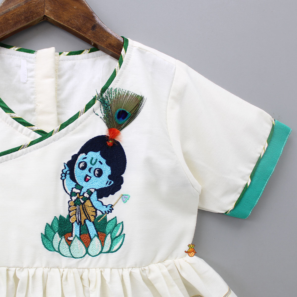 Pre Order: Krishna Embroidered Angarkha Top With Lace Work Green Dhoti And Mukut