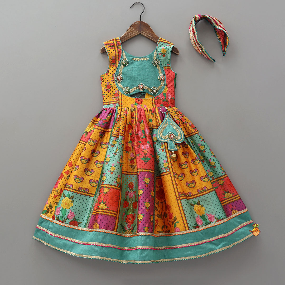 Pre Order: Elegant Multicolour Printed Sleeveless Dress With Attached Bag And Matching Hairband