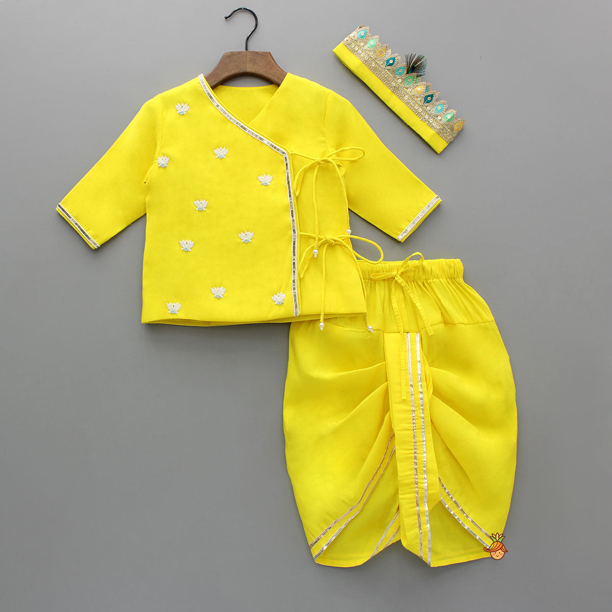 Pre Order: Dual Knot Detail Yellow Kurta And Dhoti With Mor Pankh Mukut