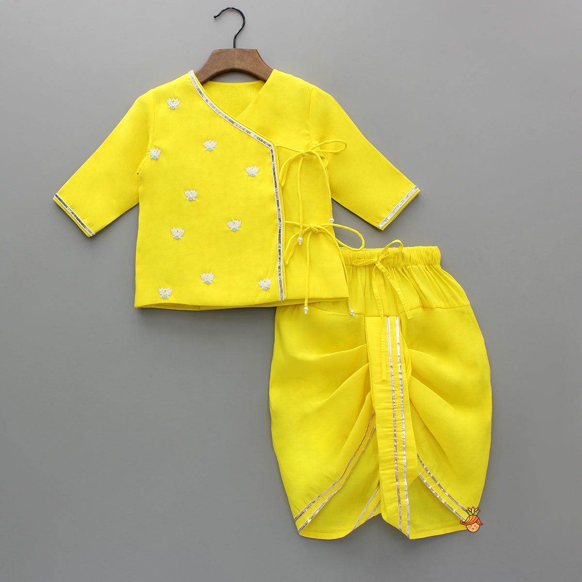 Pre Order: Dual Knot Detail Yellow Kurta And Dhoti With Mor Pankh Mukut
