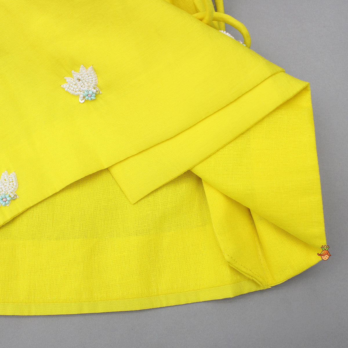 Pre Order: Dual Knot Detail Yellow Kurta And Dhoti With Mor Pankh Mukut