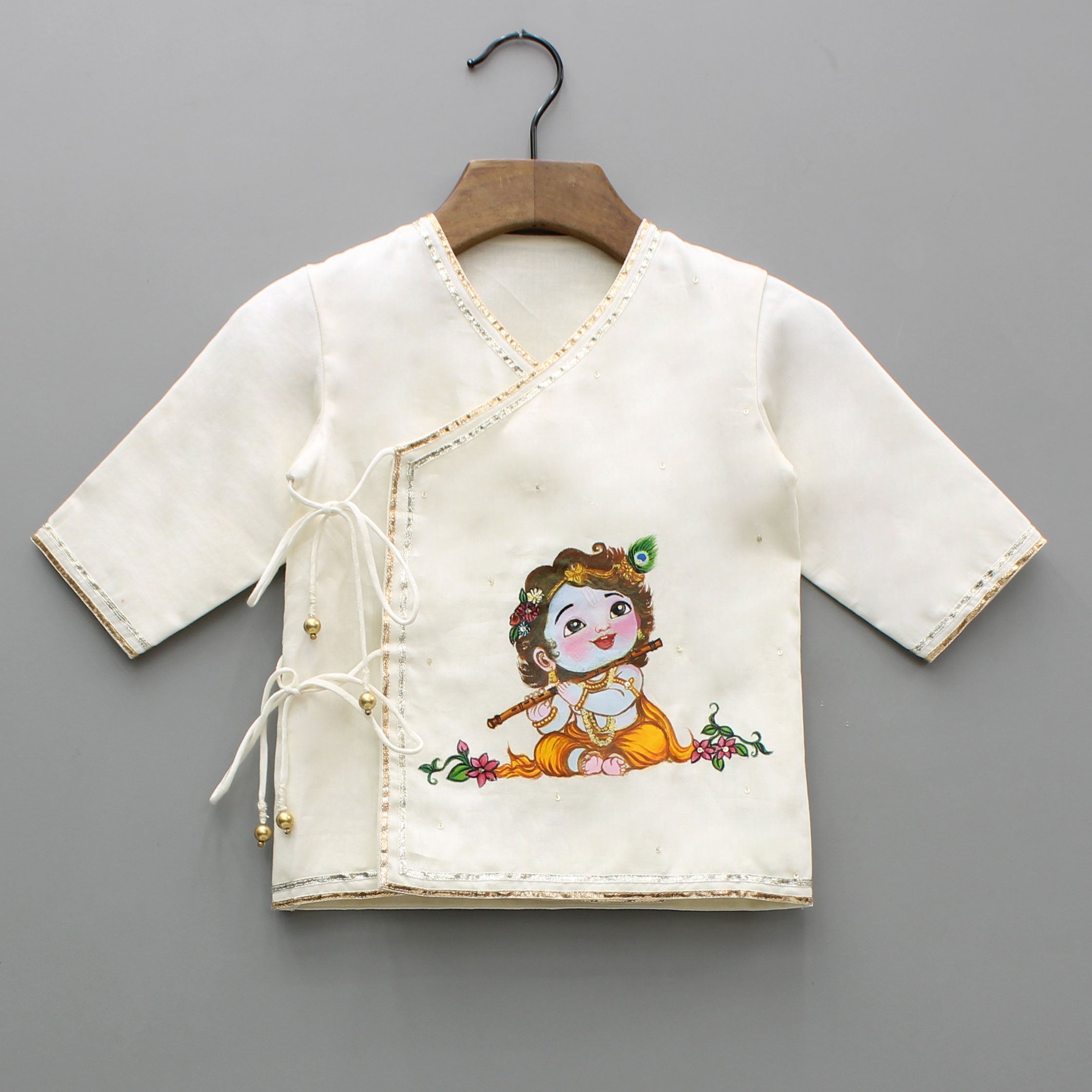 Pre Order: Krishna Hand-Painted Off-White Kurta And Lurex Striped Dhoti With Mor Pankh Mukut And Basuri