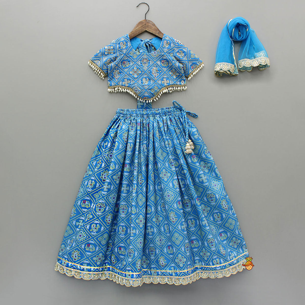 Pre Order: Blue Bandhani Printed Top With Lehenga And Dupatta