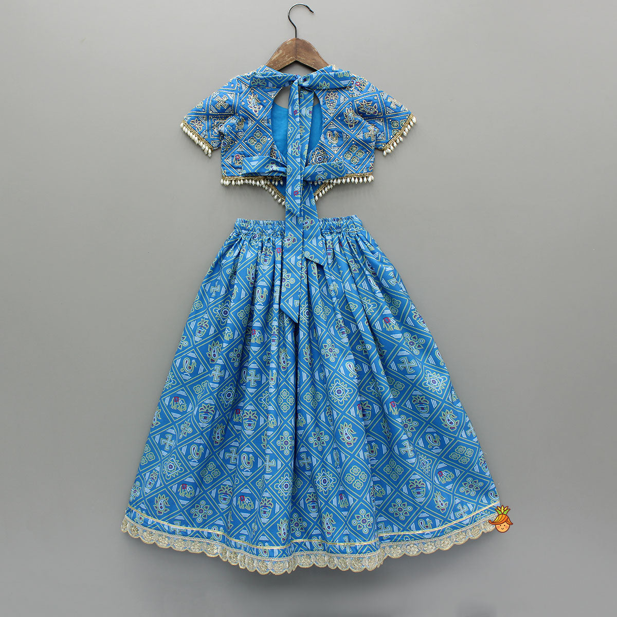 Pre Order: Blue Bandhani Printed Top With Lehenga And Dupatta