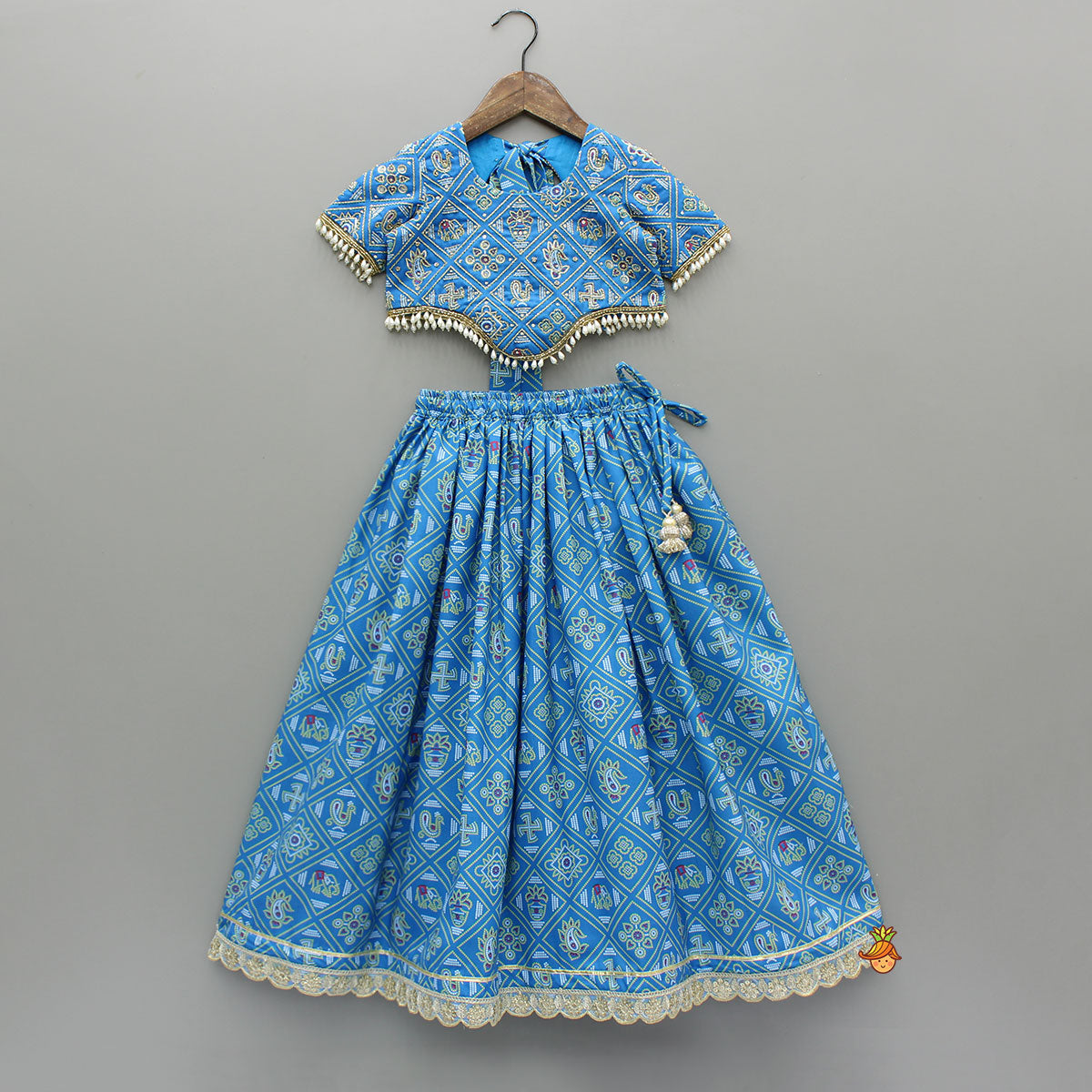Pre Order: Blue Bandhani Printed Top With Lehenga And Dupatta