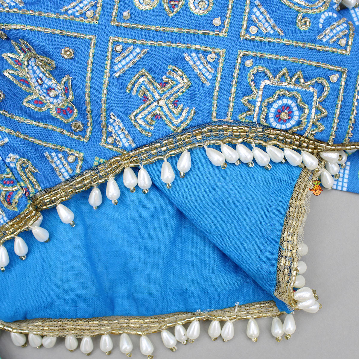 Pre Order: Blue Bandhani Printed Top With Lehenga And Dupatta