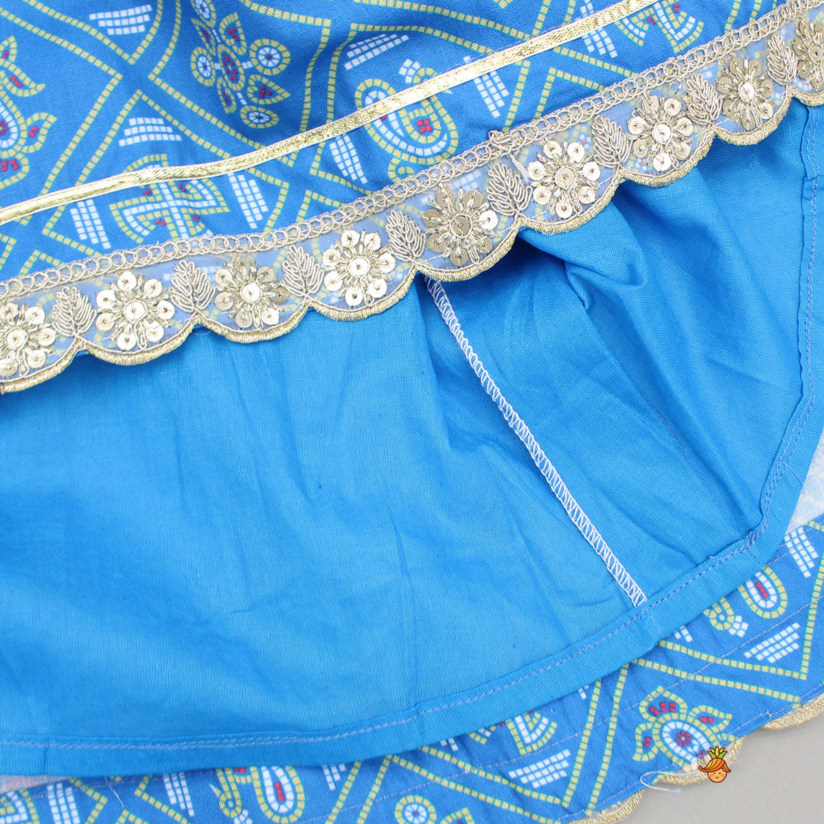 Pre Order: Blue Bandhani Printed Top With Lehenga And Dupatta