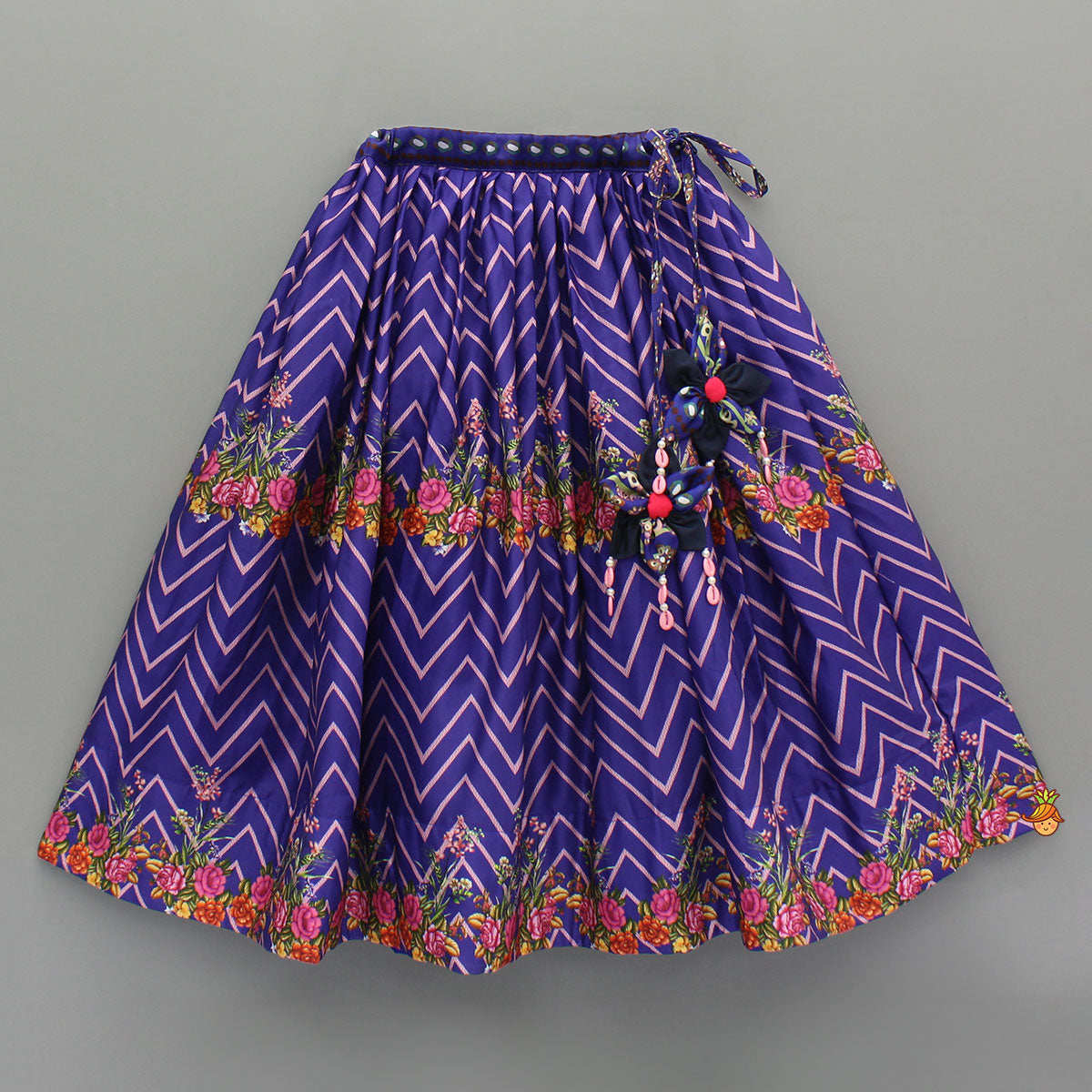 Pre Order: Layered Sleeves Blue Top And Fabric Flower Tassels Enhanced Lehenga With Purple Net Dupatta