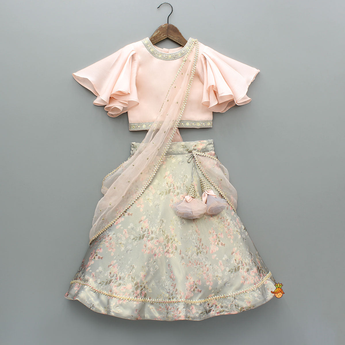 Pre Order: Peach Ruffle Sleeves Top With Shimmery Floral Lehenga And Attached Dupatta