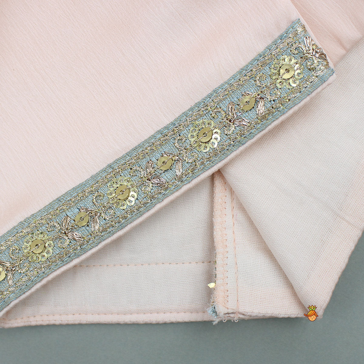 Pre Order: Peach Ruffle Sleeves Top With Shimmery Floral Lehenga And Attached Dupatta