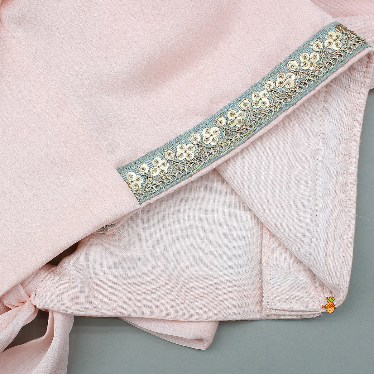 Pre Order: Peach Ruffle Sleeves Top With Shimmery Floral Lehenga And Attached Dupatta