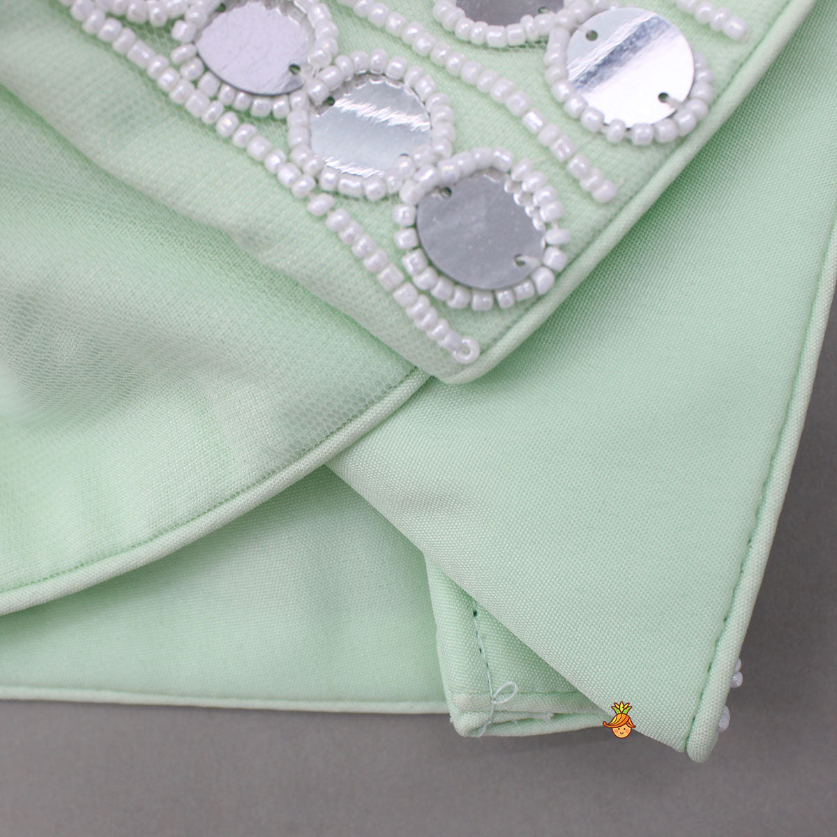 Pre Order: Beautiful Green Faux Mirror Embroidered Top With Net Palazzo