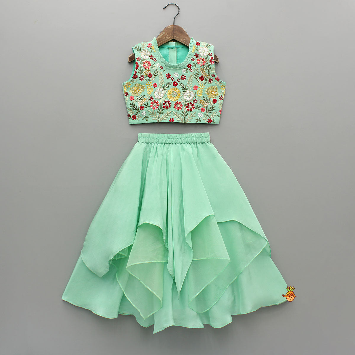 Pre Order: Beautiful Floral Embroidered Green Top With Asymmetrically Layered Lehenga