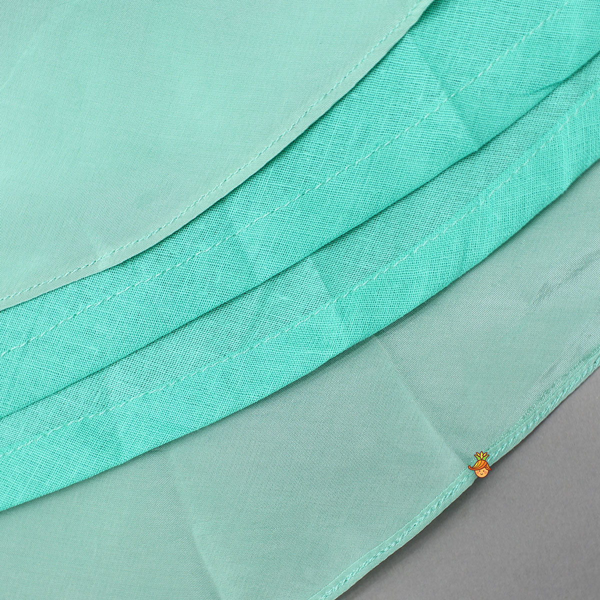 Pre Order: Beautiful Floral Embroidered Green Top With Asymmetrically Layered Lehenga