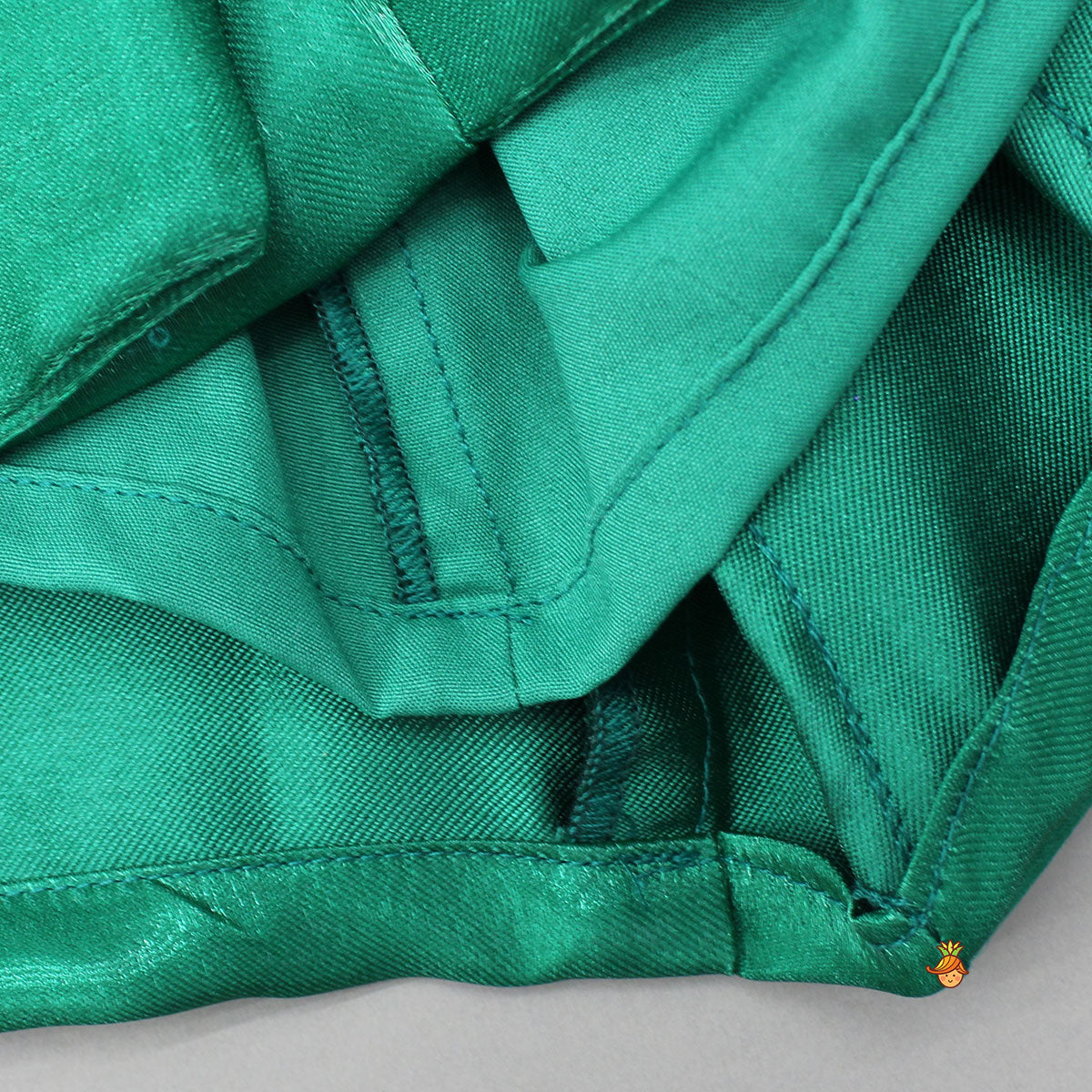 Pre Order: Sheen Green Satin Pleated Dress With Red Floral Tie-Up Detail
