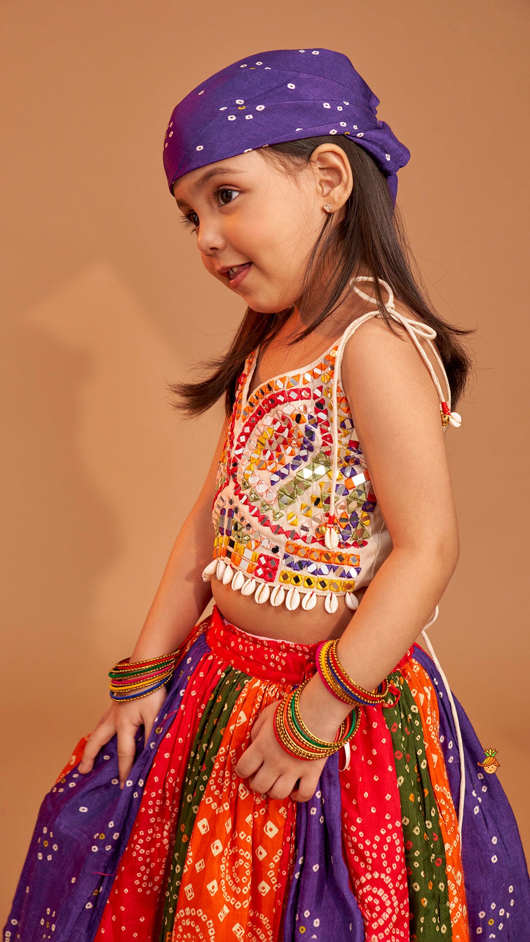 Pre Order: Beautiful Mirror Hand Embroidered Tie-up Top With Multicolour Bandhani Printed Lehenga And Bandana