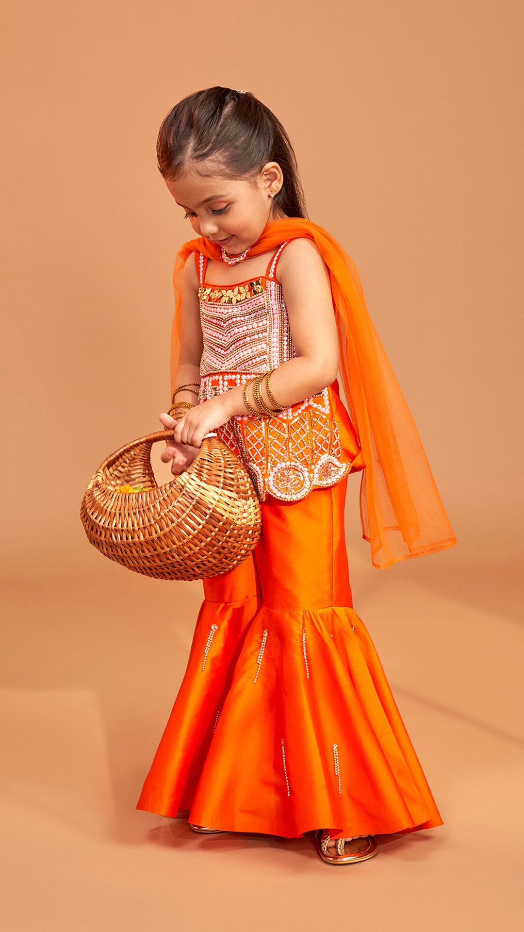 Pre Order: Exquisite Orange Kurti With Flared Sharara And Choker Dupatta