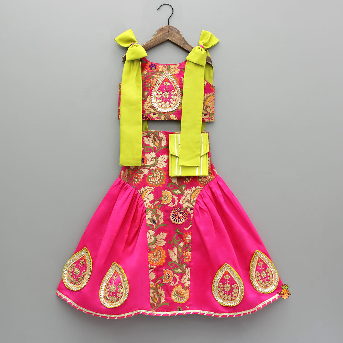 Pre Order: Stunning Bow Embellished Floral Top With Matching Lehenga And Attached Pouch