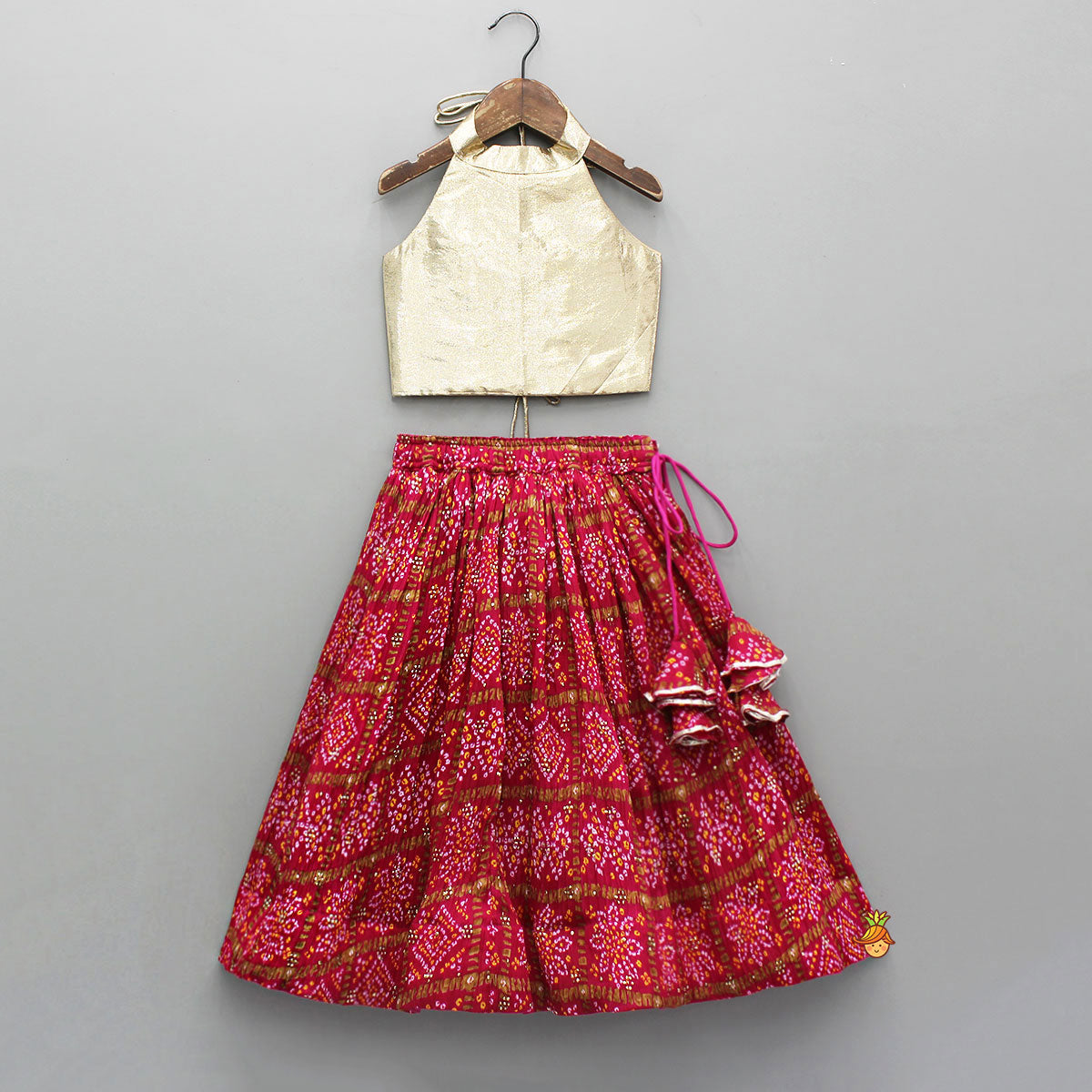 Pre Order: Halter Neck Top With Pink Bandhani Printed Lehenga
