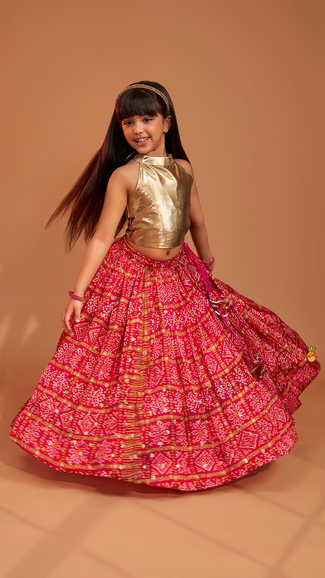 Pre Order: Halter Neck Top With Pink Bandhani Printed Lehenga