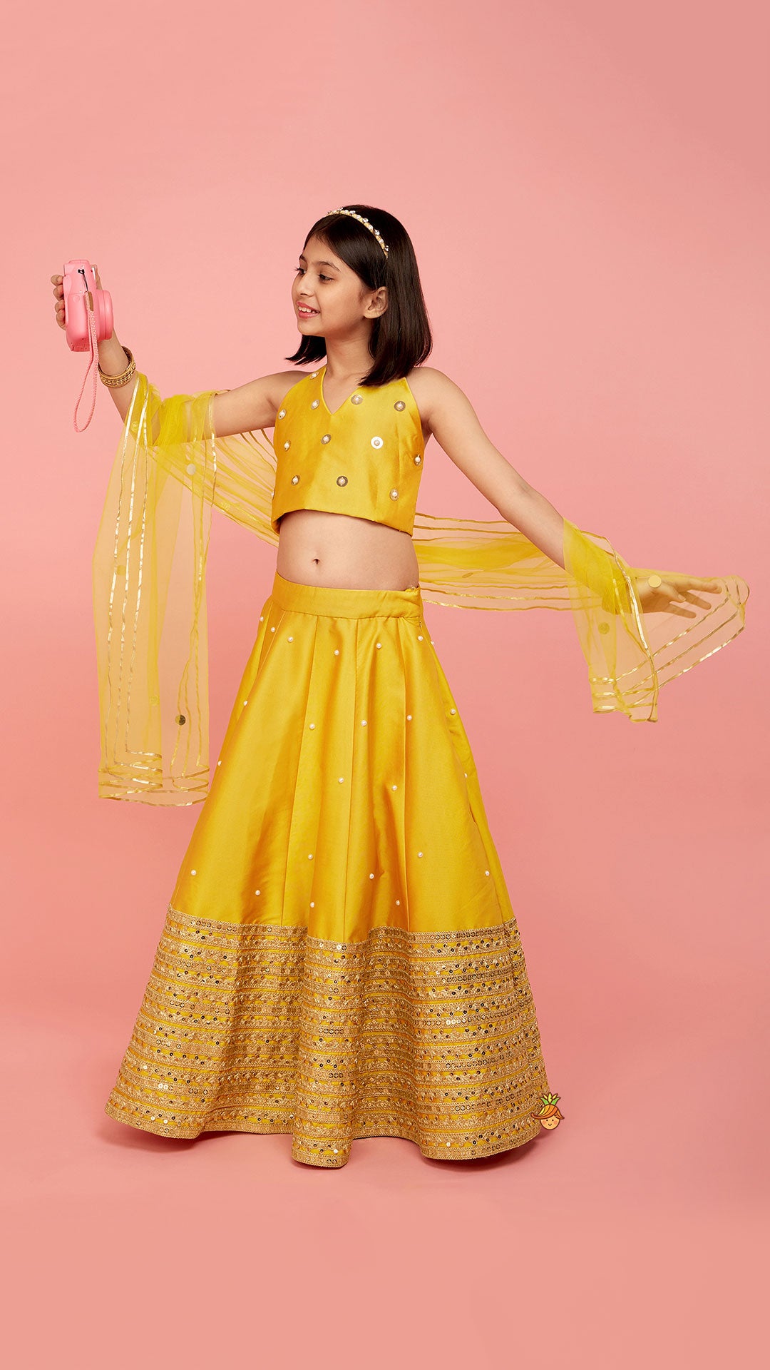 Pre Order: Open Back Halter Neck Mustard Yellow Top And Flared Lehenga With Gota Lace Detail Dupatta