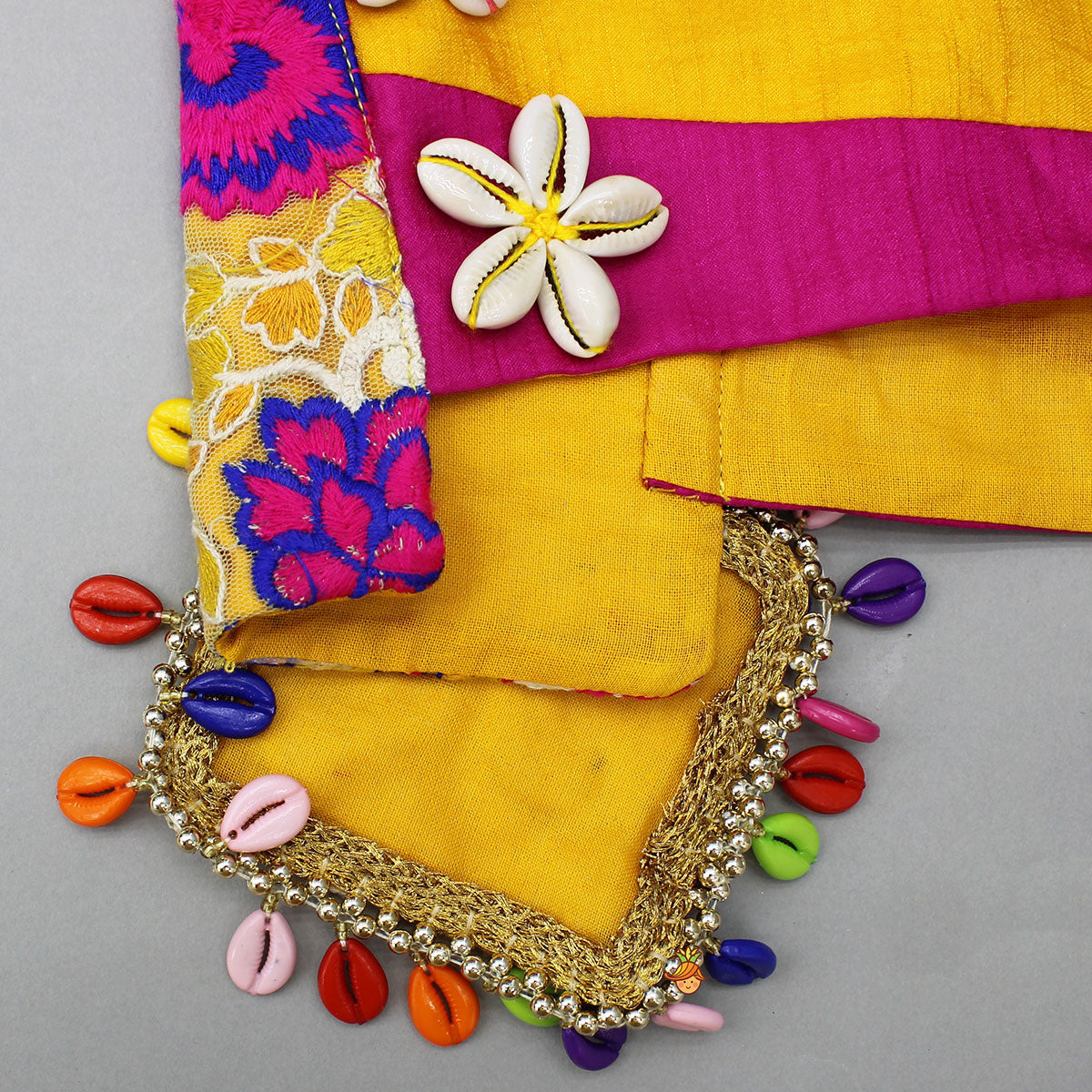 Pre Order: Cowrie Shell Embellished Yellow Embroidered Top With Lehenga