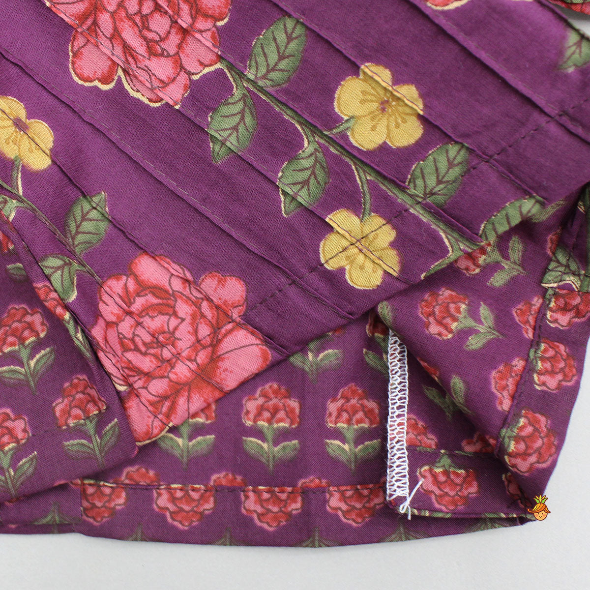 Pre Order: Floral Printed Pin Tuck Detailed Purple Top With Matching Lehenga