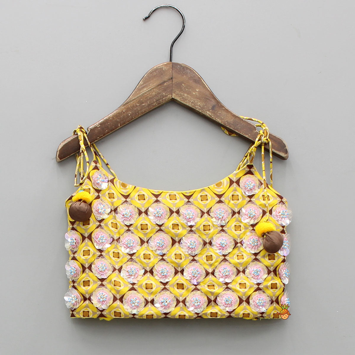 Pre Order: Flowers Adorned Smocked Tie Up Top With Lehenga And Waist Belt