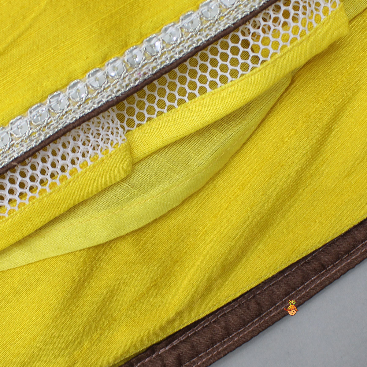 Pre Order: Flowers Adorned Smocked Tie Up Top With Lehenga And Waist Belt