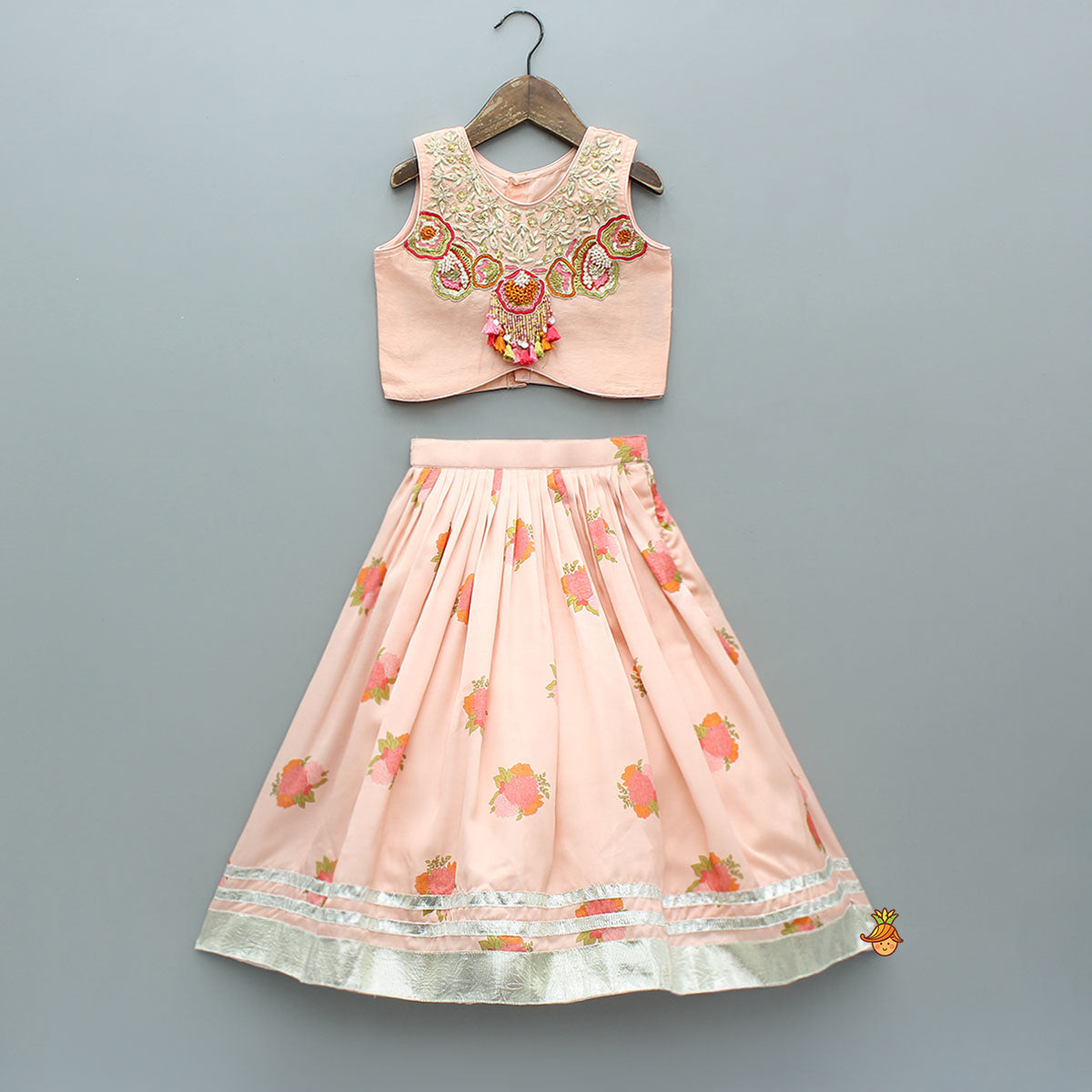 Pre Order: Fringe-Detailed Embroidered Top With Lehenga And Net Dupatta With Matching Potli Bag