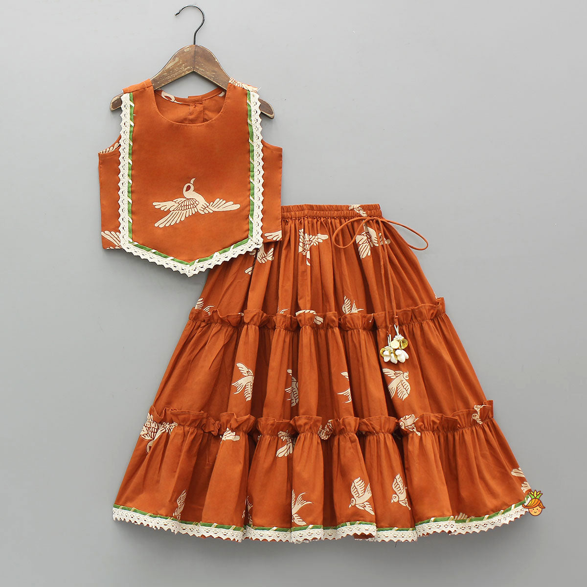 Pre Order: Bird-Printed Sleeveless Ethnic Top With Tiered Lehenga