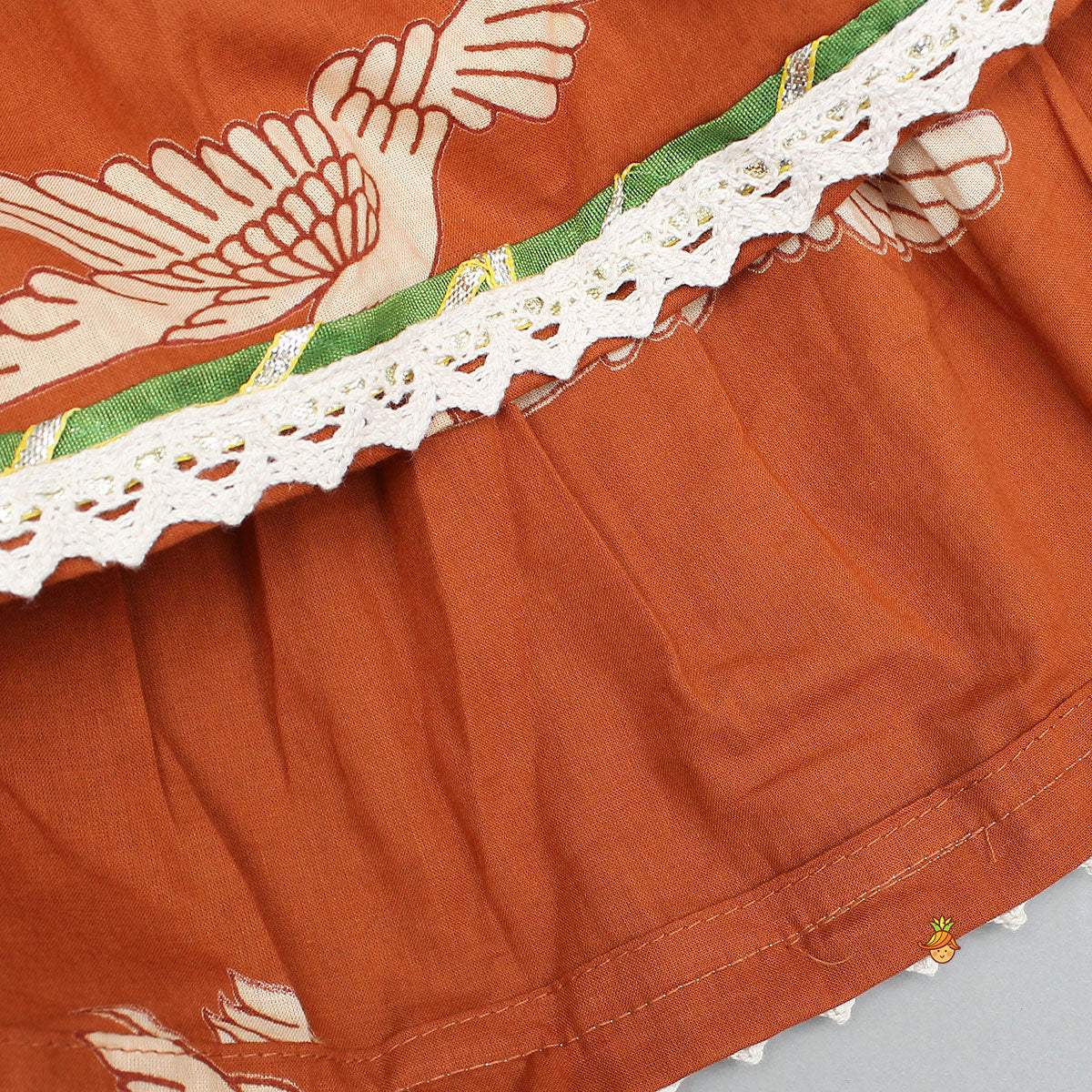 Pre Order: Bird-Printed Sleeveless Ethnic Top With Tiered Lehenga