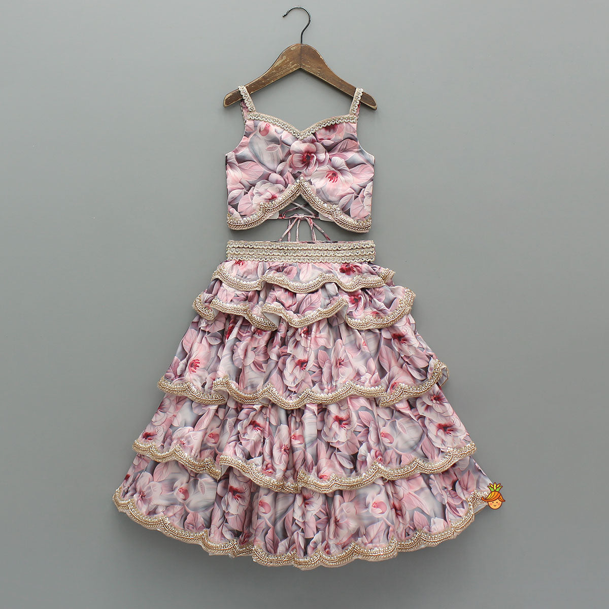 Pre Order: Printed Strappy Top And Graceful Layered Lehenga