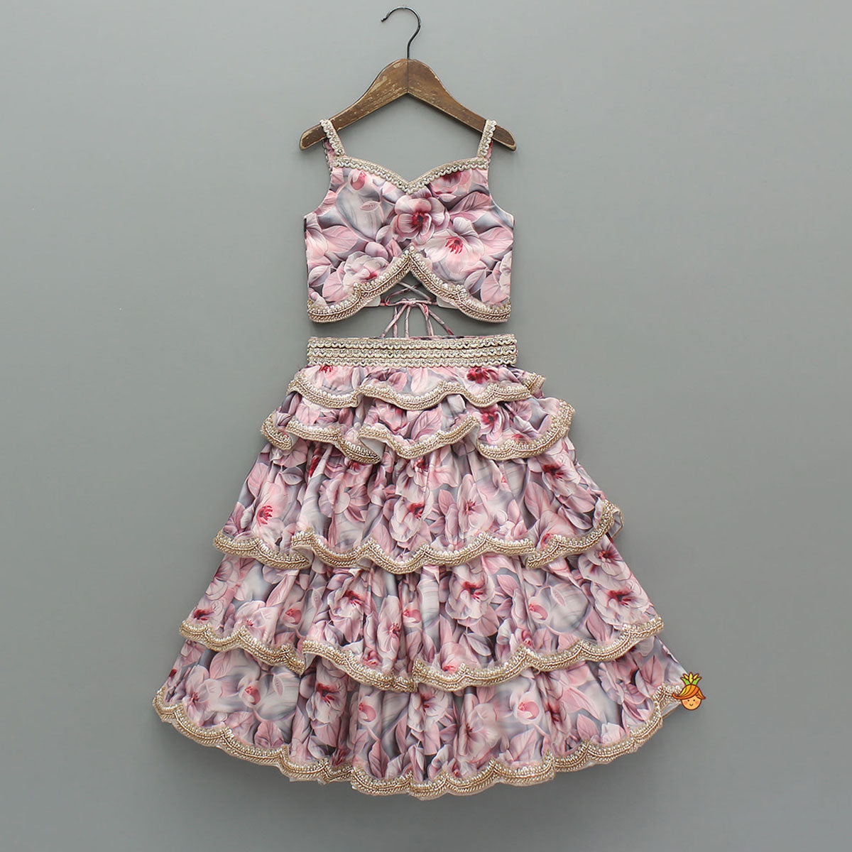 Pre Order: Printed Strappy Top And Graceful Layered Lehenga