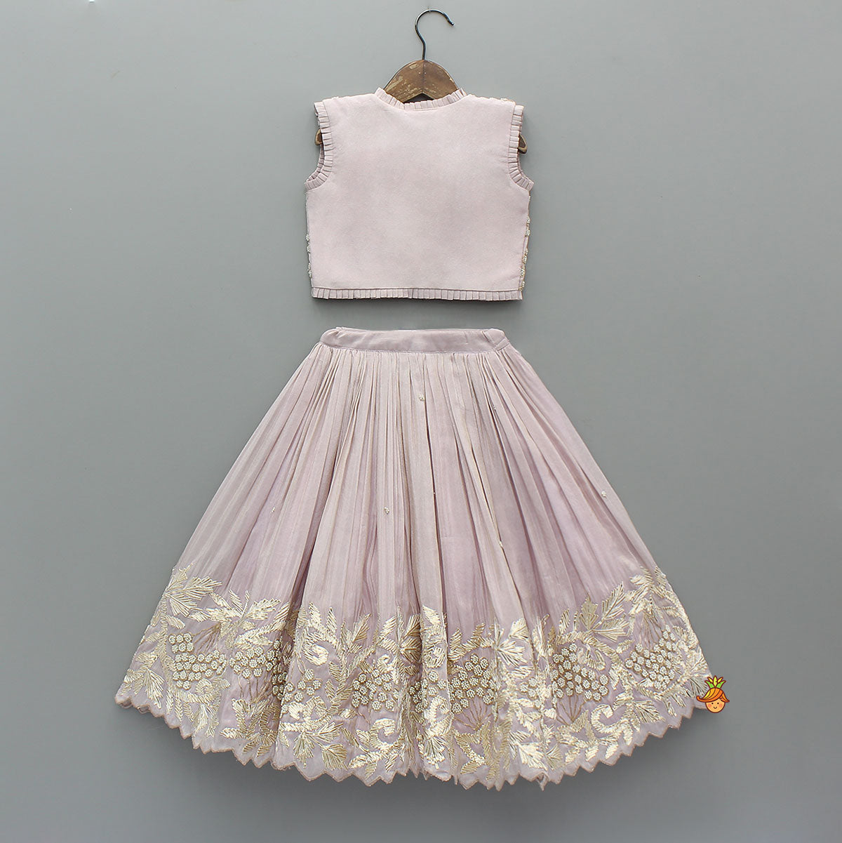 Pre Order: Embroidered Stylish Hem Shimmery Top And Pleated Lehenga With Net Dupatta