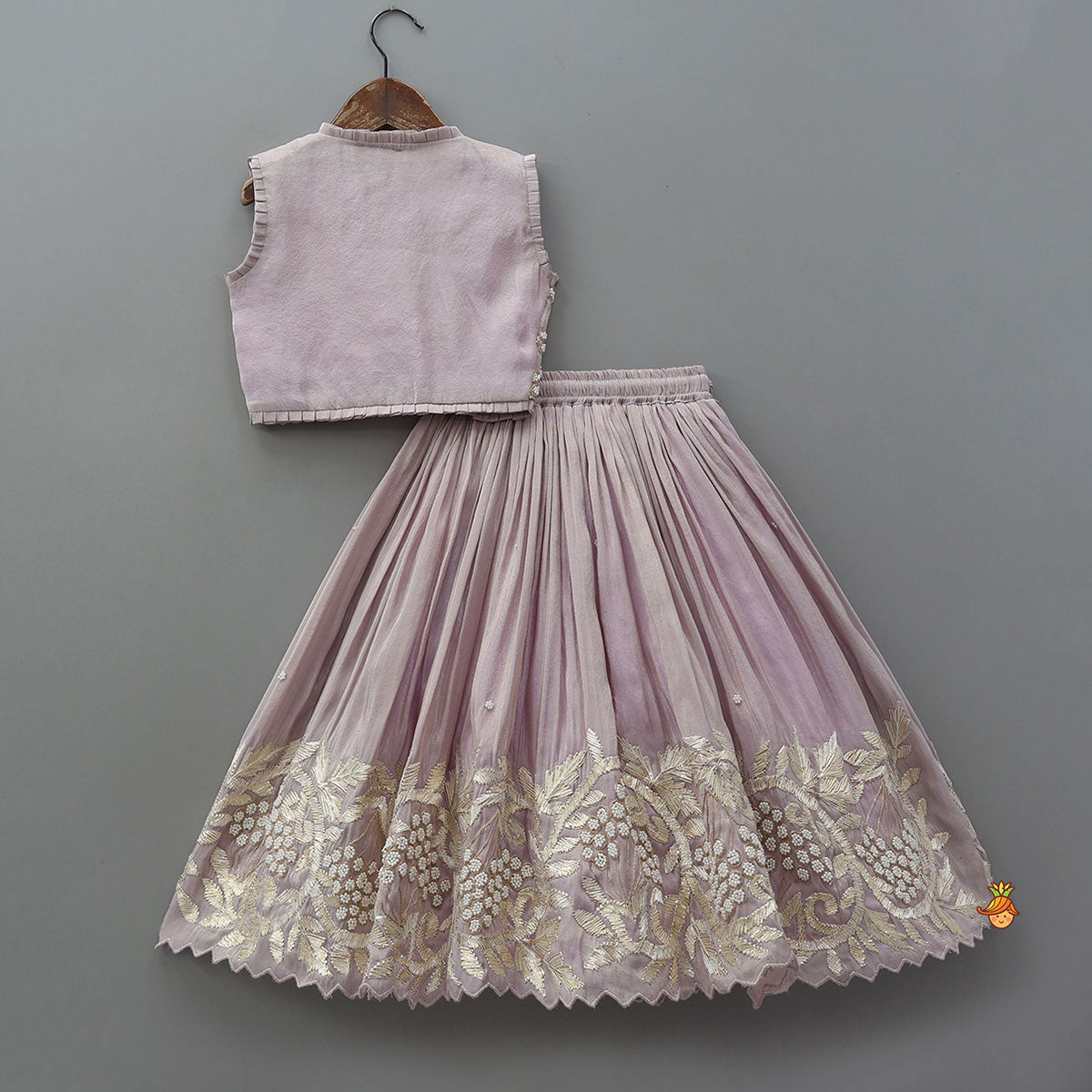 Pre Order: Embroidered Stylish Hem Shimmery Top And Pleated Lehenga With Net Dupatta