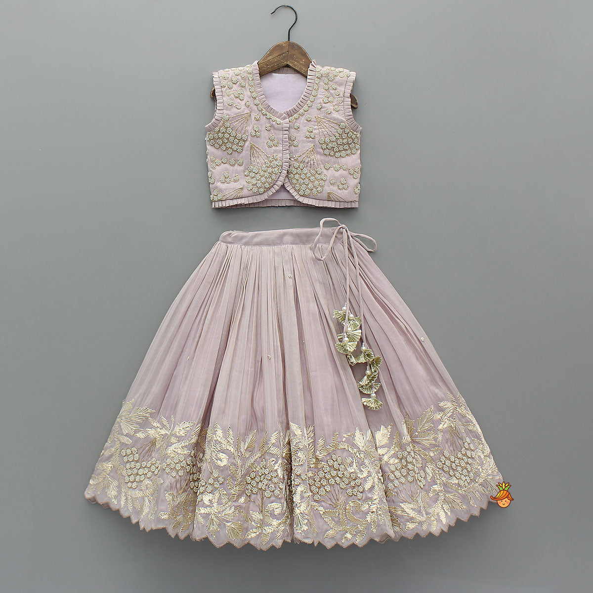 Pre Order: Embroidered Stylish Hem Shimmery Top And Pleated Lehenga With Net Dupatta